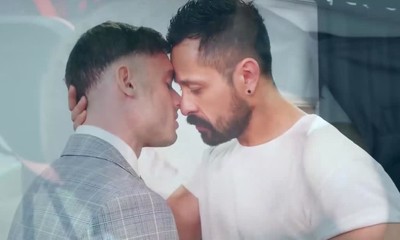 Suited stud Cristian Sam drills Manuel Reyes ass deep in office