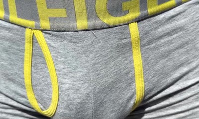 Ripped & Muscular Stud Tristan Flexing outdoors